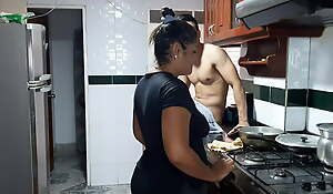 My stepmom gives me a tasty blowjob in the kitchen