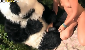 Panda's huge strapon dildo made the girl aroused too, and she got roughly to suck it. Then she let the panda bang her with that brutal dildo. Oh, this hot sex play is a must-see!