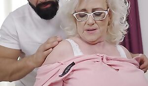 Busty gran squirts and takes vitamin Dick