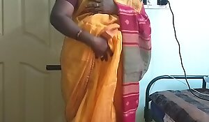 Desi indian horny tamil telugu kannada malayalam hindi cheating wife vanitha wearing orange colour saree showing big boobs and shaved pussy press hard boobs press nosh rubbing pussy berating