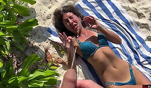 Pissed on unspecific on a public beach - She was shocked