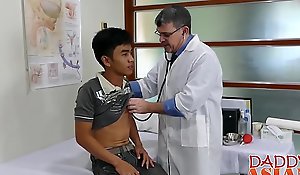 Young Asian barebacked during doctors appointment