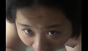 Chinese girl giving sloppy blow job