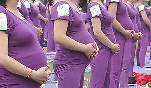 Pregnant Asian column doing yoga (non porn)