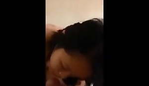 Singaporean phoning her boyfriend while blowing choice man