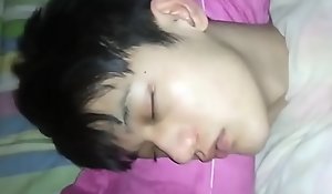 Handsome sleeping Chinese boy