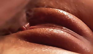Beautiful pussy unperceived in lubricator and cum. Close-up